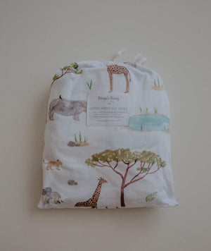 African Safari Cot Sheet by Snuggle Hunny Kids in draw string bag