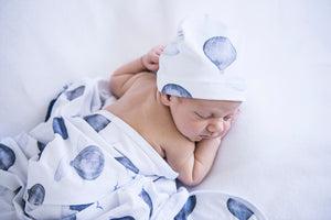Baby wrapped in Cloud chaser jersey wrap and beanie
