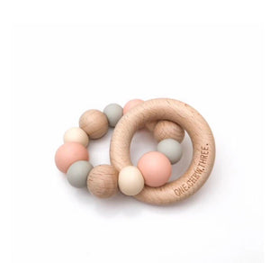Peach coloured silicone bead and natural beech wood teether