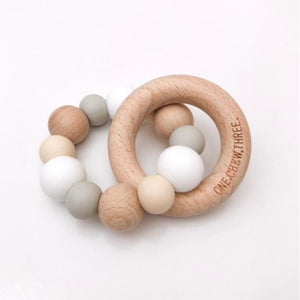 White silicone bead and natural beech wood teether